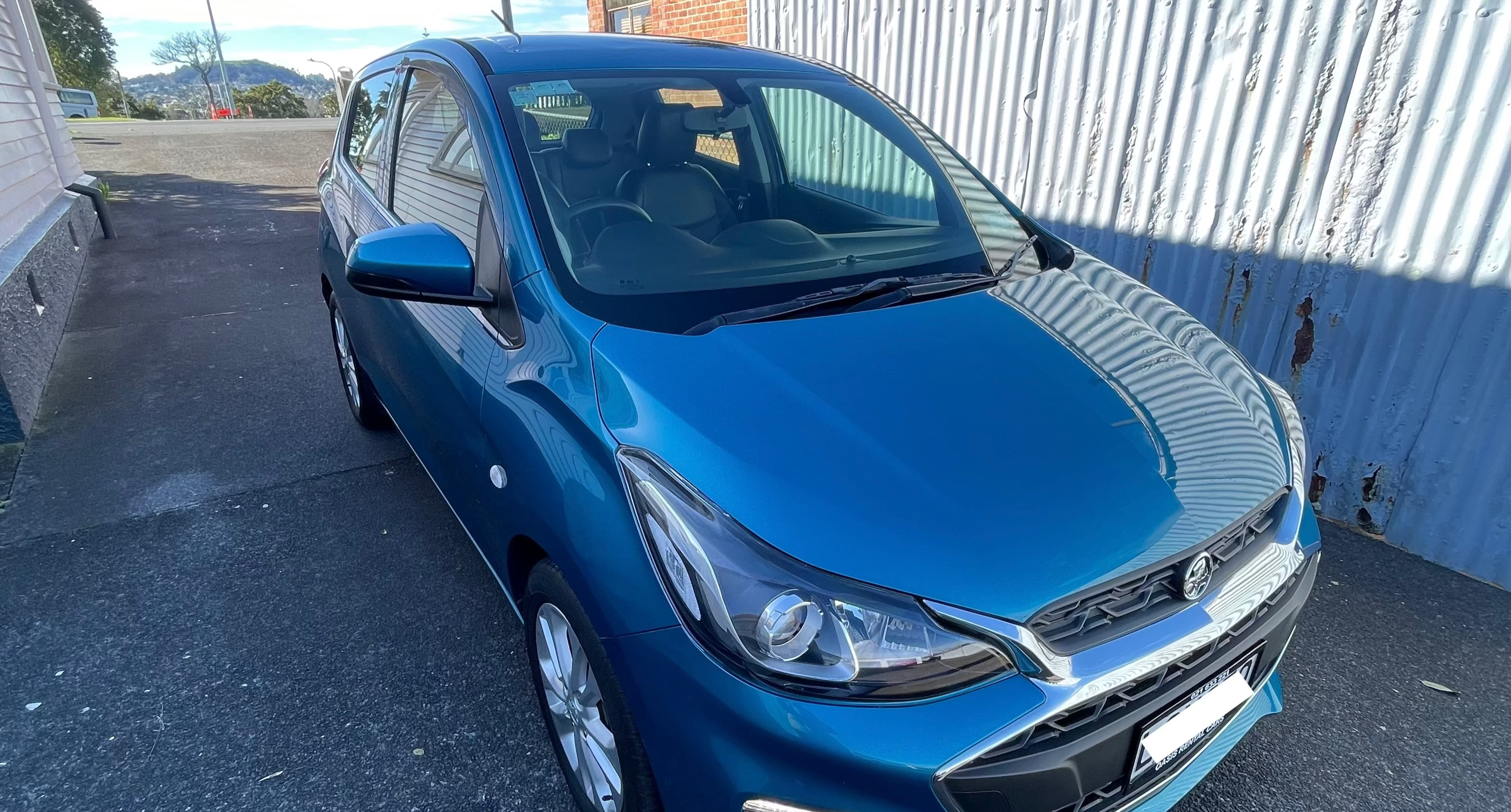 Holden Spark economy hatchback rear view – Oasis Rentals Auckland
